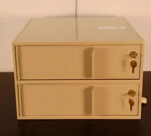 Beige two-drawer lockbox with keys