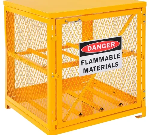Yellow metal cage labeled flammable materials