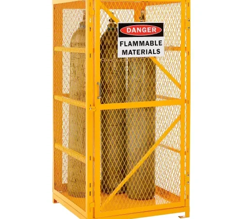 Gas cylinders in yellow cage with danger sign