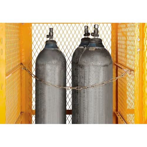 Compressed gas cylinders secured in yellow metal cage