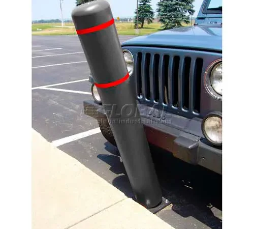 Black bollard leaning against blue Jeep grille
