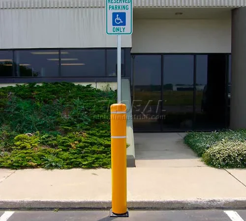Accessible parking sign with yellow bollard
