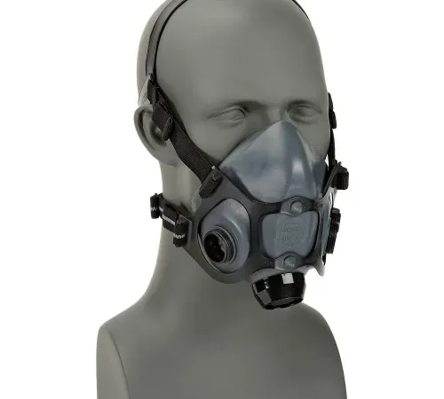 Half-face respirator mask with straps on mannequin