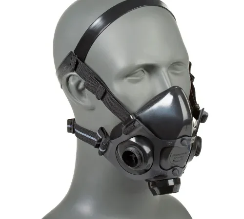 Black half-face respirator mask on mannequin