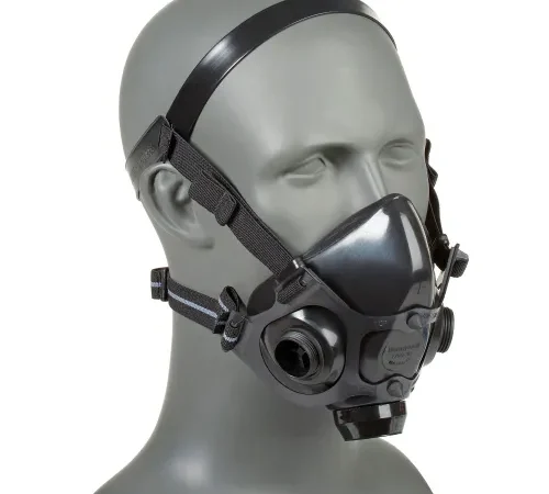 Dual-filter half-face respirator mask on mannequin