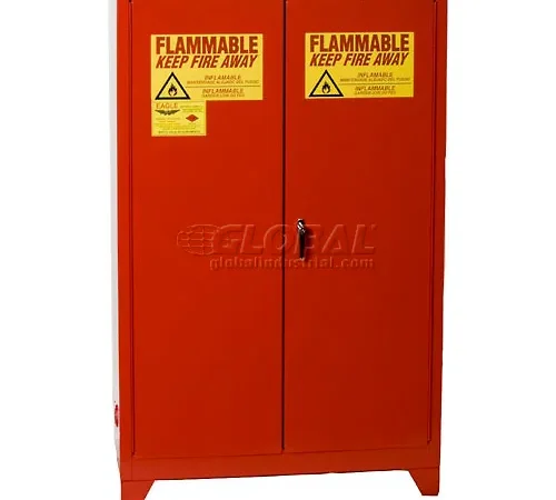 Red flammable storage cabinet with warning labels