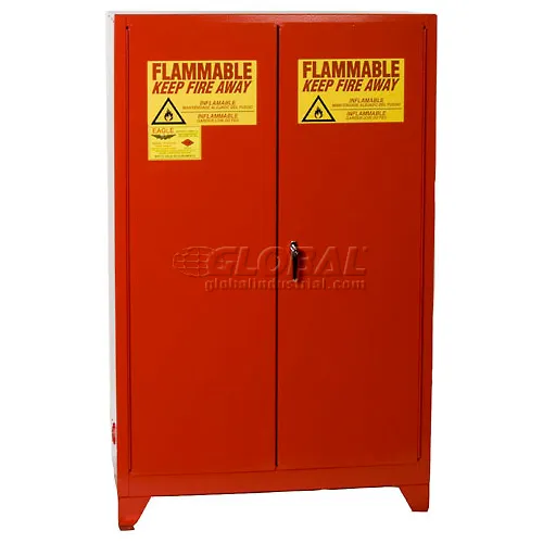 Red flammable storage cabinet with warning labels