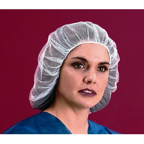 Person wearing white hairnet and blue scrubs
