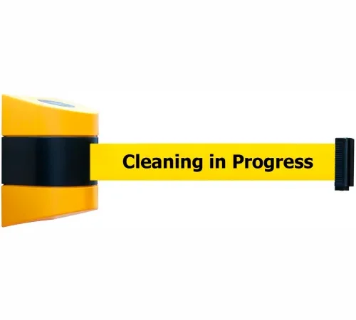 Yellow retractable barrier reading "Cleaning in Progress