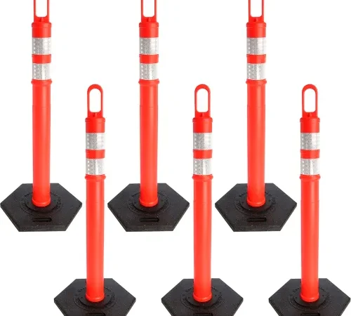 Six red reflective traffic delineator posts