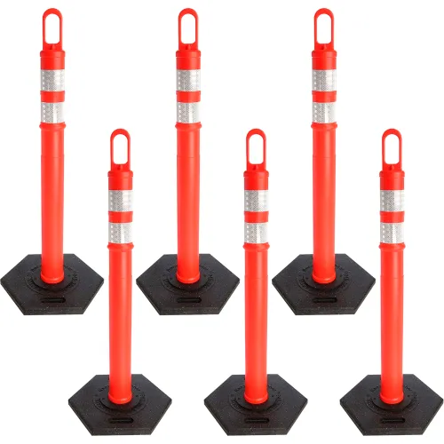 Six red reflective traffic delineator posts