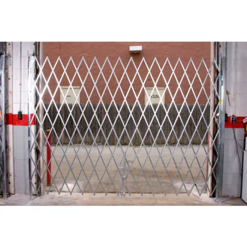Metal accordion security gate across garage entrance