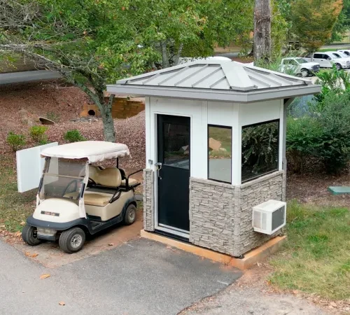 Security kiosk with parked golf cart
