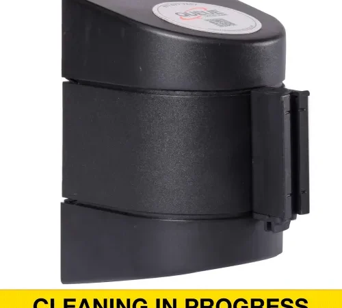 Black wall-mounted dispenser, CLEANING IN PROGRESS