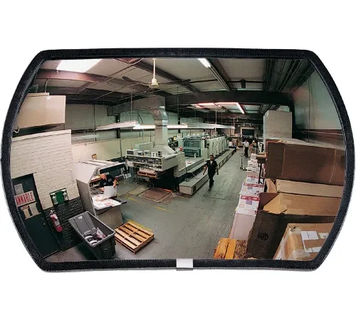 Industrial printing press reflected in convex mirror