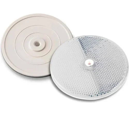 Pair of round white safety reflectors