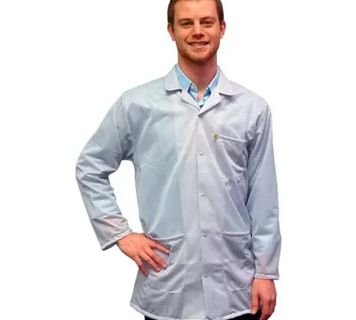 Smiling man wearing light blue lab coat