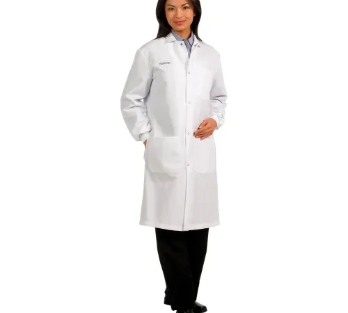 Woman wearing white lab coat, smiling