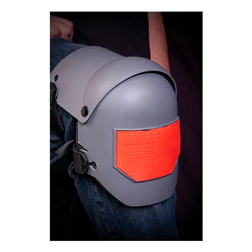 Gray knee pad with orange protective plate